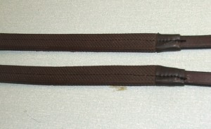 New rubber rein grips stitched onto leather reins