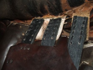 Handmade English Leather girth straps hand stitch onto saddle